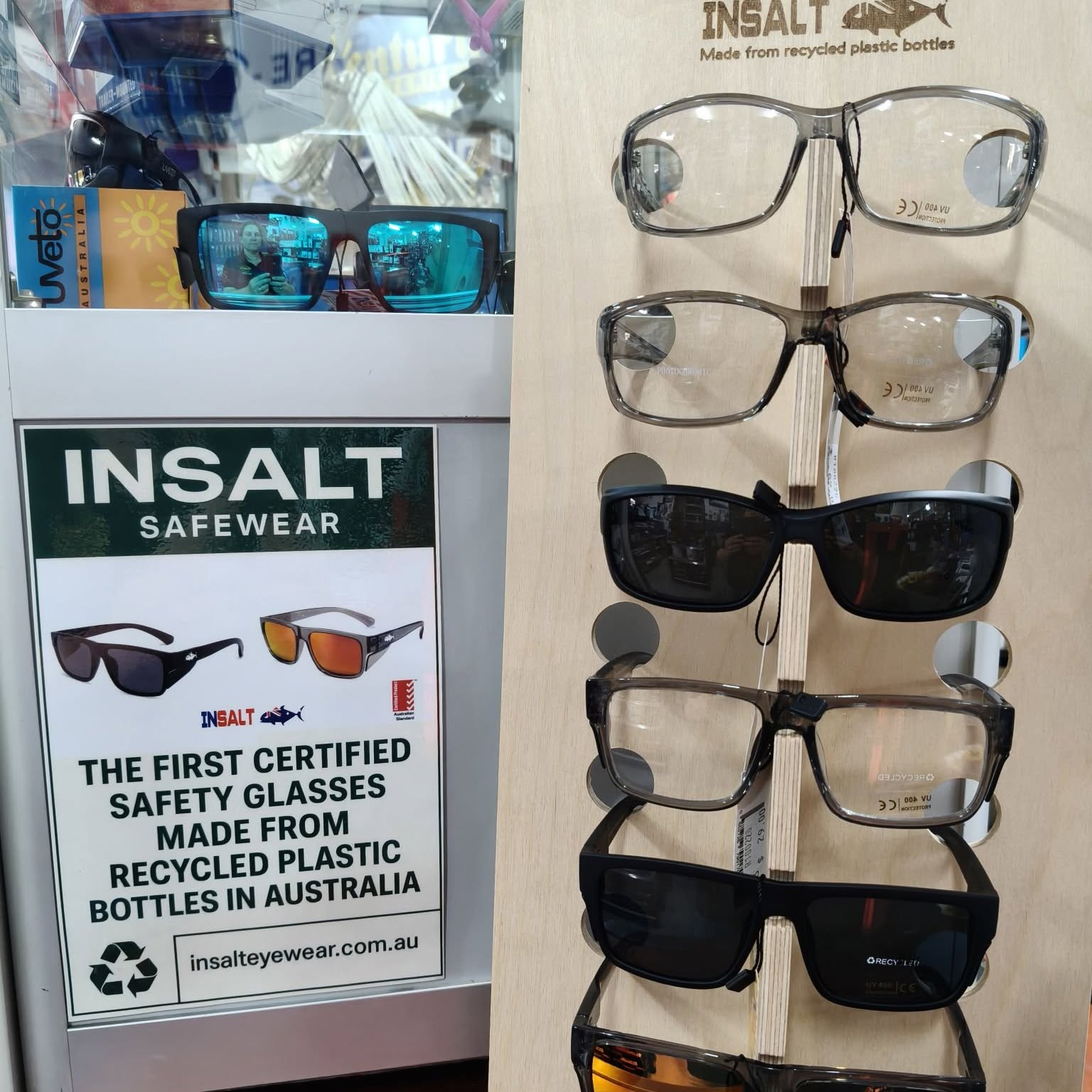 A rack of INSALT Safewear safety glasses in store